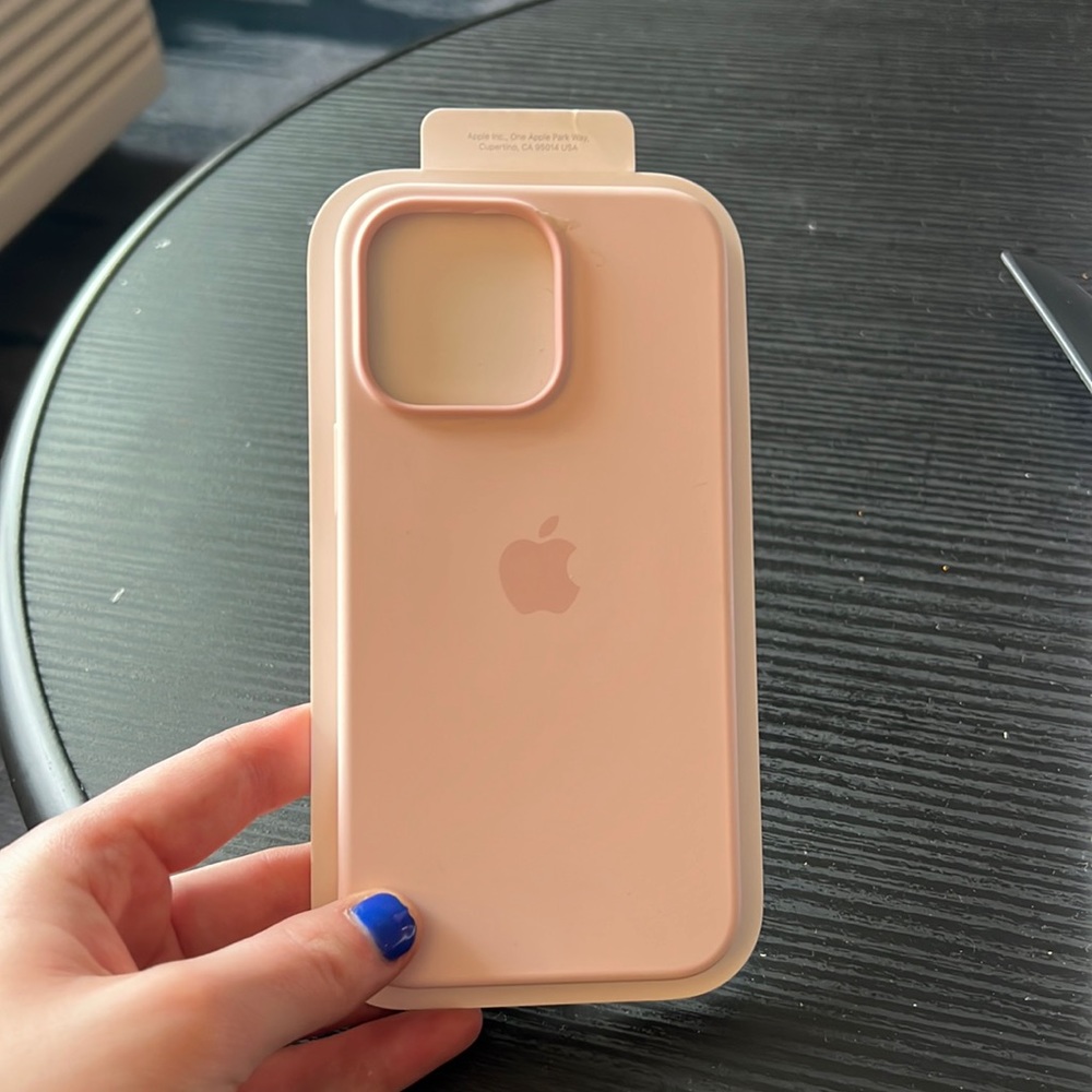 Never used iPhone 13 pro case, beautiful soft pink and smooth texture case.
